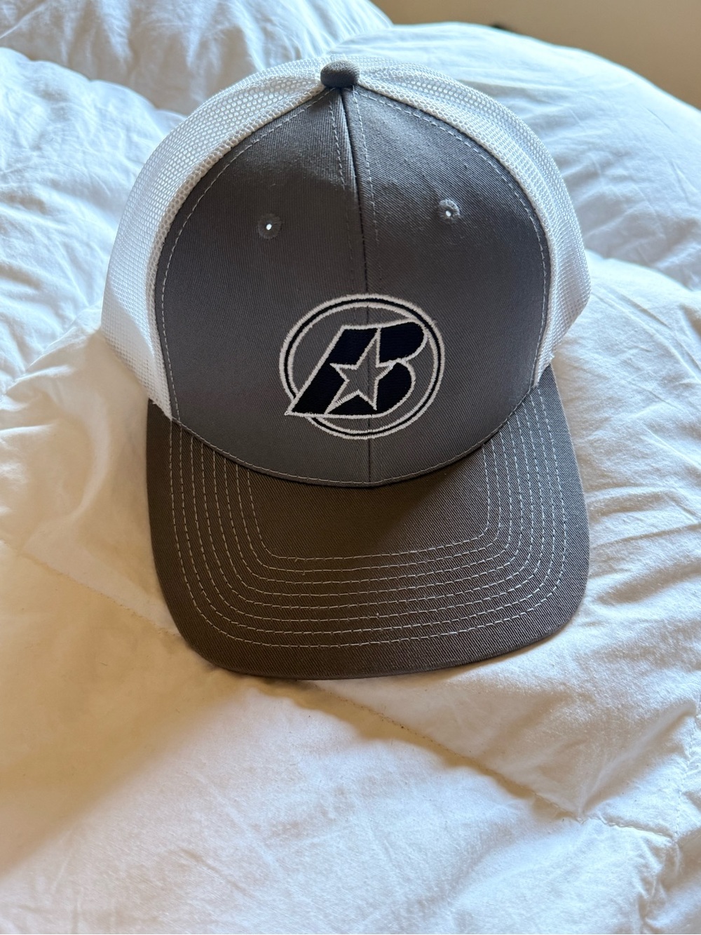 Gray and White Trucker Hat with Star Logo
